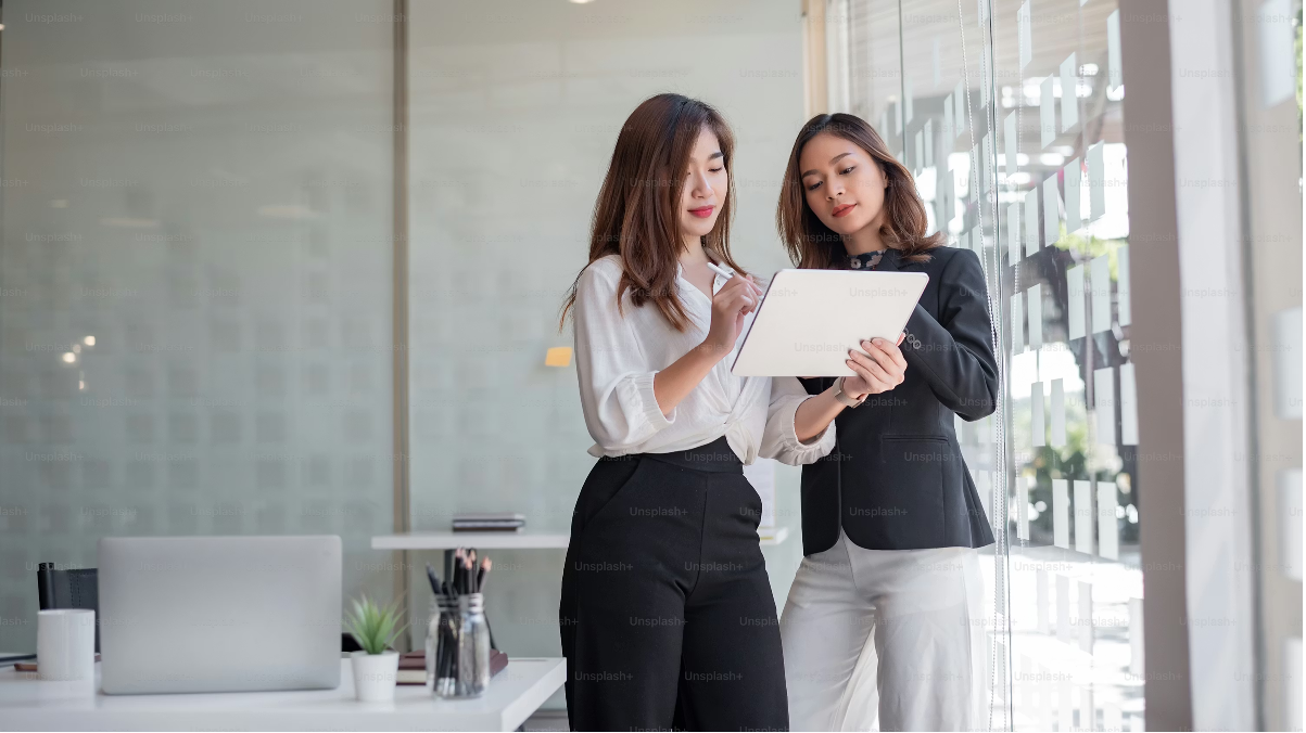 Confident female real estate agent negotiating property sale at a property in Melbourne Victoria