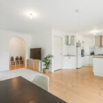 Modern white kitchen with gas cooktop at 25 McKeon Circuit Dandenong North VIC