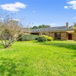Alternate view of the well-appointed kitchen at 255 Toongabbie-Cowwarr Road, Toongabbie VIC, highlighting its practical layout and connection to the surrounding living spaces. Designed for comfort and functionality, the kitchen forms a central hub within this peaceful Gippsland lifestyle home.