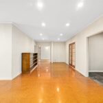 Formal living room with parquetry floors and fireplace Toongabbie rural home