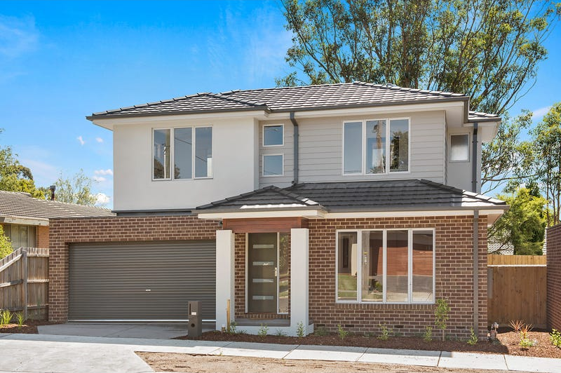 Front exterior of modern townhouse for rent at 8B Haros Avenue Nunawading VIC with private driveway and contemporary façade