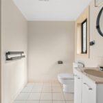 Laundry area inside townhouse for rent at 8B Haros Avenue Nunawading VIC with modern cabinetry and utility space