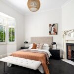 Second bedroom with period fireplace and natural light – Camberwell home for sale