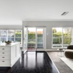 Open plan kitchen living area with timber floors – Camberwell family home