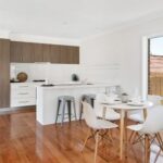 Open plan meals and kitchen area in townhouse for rent at 8B Haros Avenue Nunawading VIC with timber floors and modern kitchen