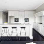 Modern white kitchen with island bench – Camberwell renovated home