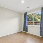 Extended parking space at 15 Trafalgar Way Cranbourne East VIC 3977 suitable for a caravan, trailer or boat, in addition to a secure double garage. Features like this contributed to strong buyer demand and a successful sale at $745,000 in the competitive Cranbourne East property market.